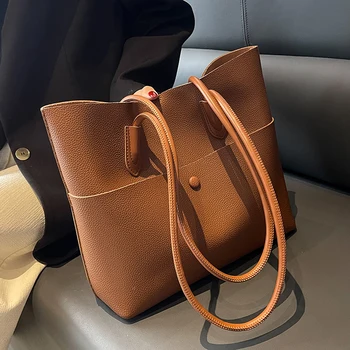 Винтажная женская сумка-тоут 2022 года, новые простые сумки через плечо большой емкости, повседневная сумка из искусственной кожи подмышками.